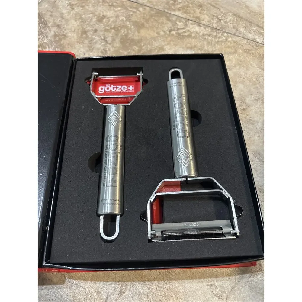 New- Sealed- Gotze The Forever Guarantee Stainless Steel Peelers Set!